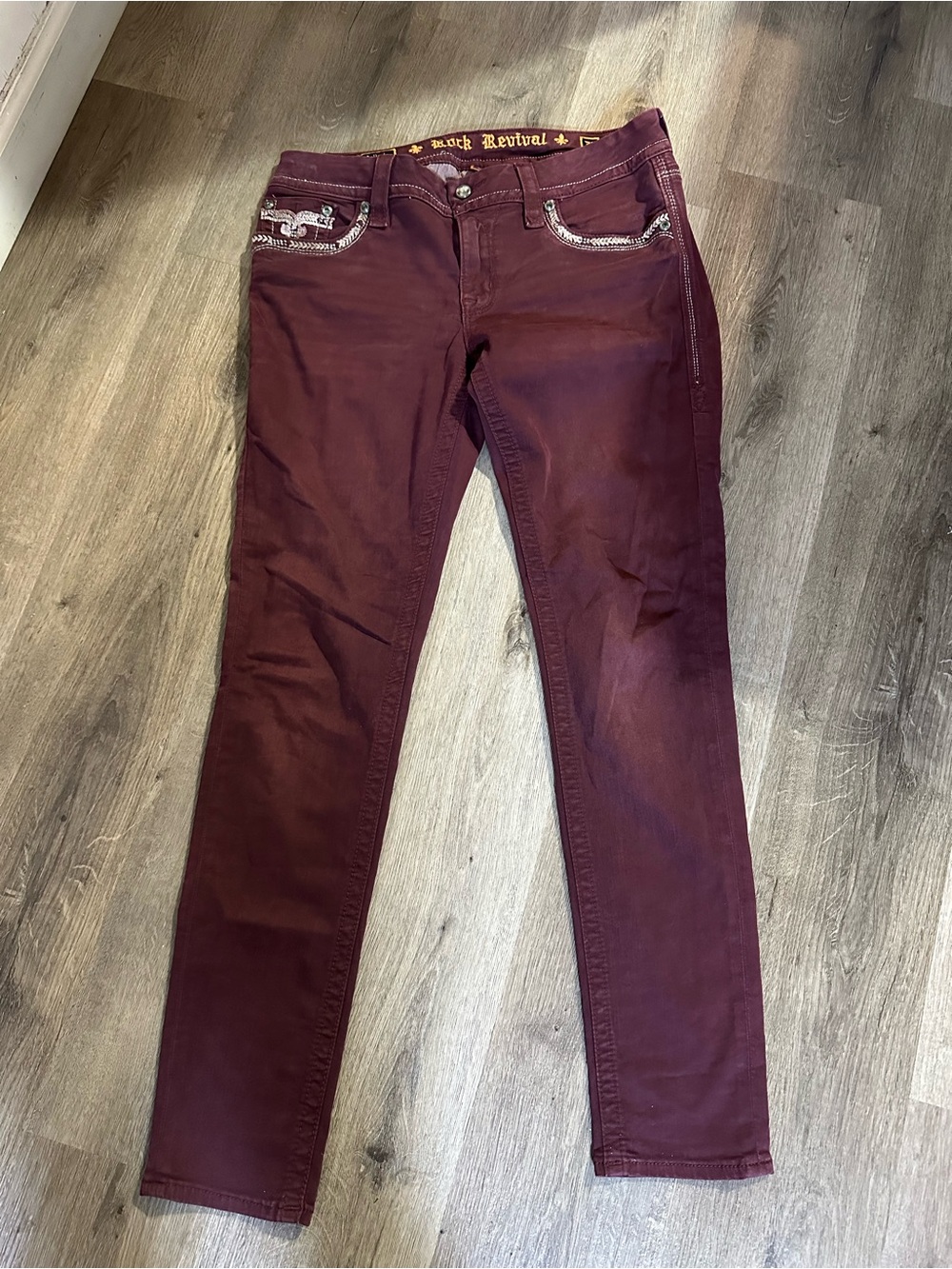 Rock Revival Burgundy Skinny Jeans with Embellished Pockets